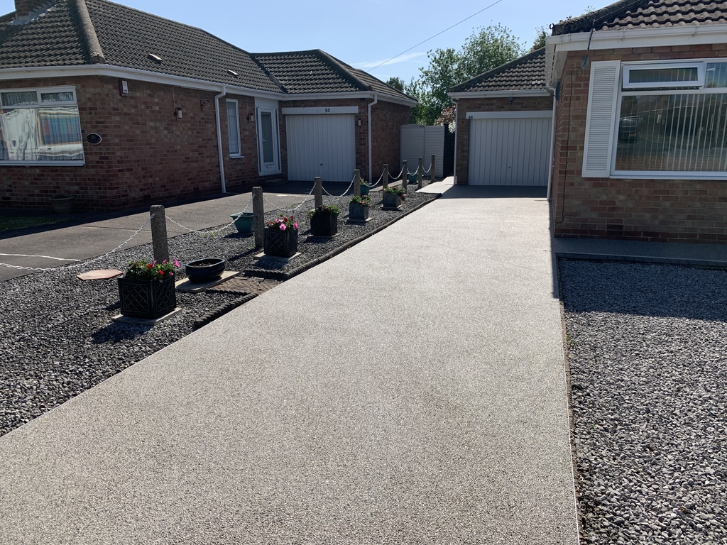 Garden view of grey resin drive in Willerby